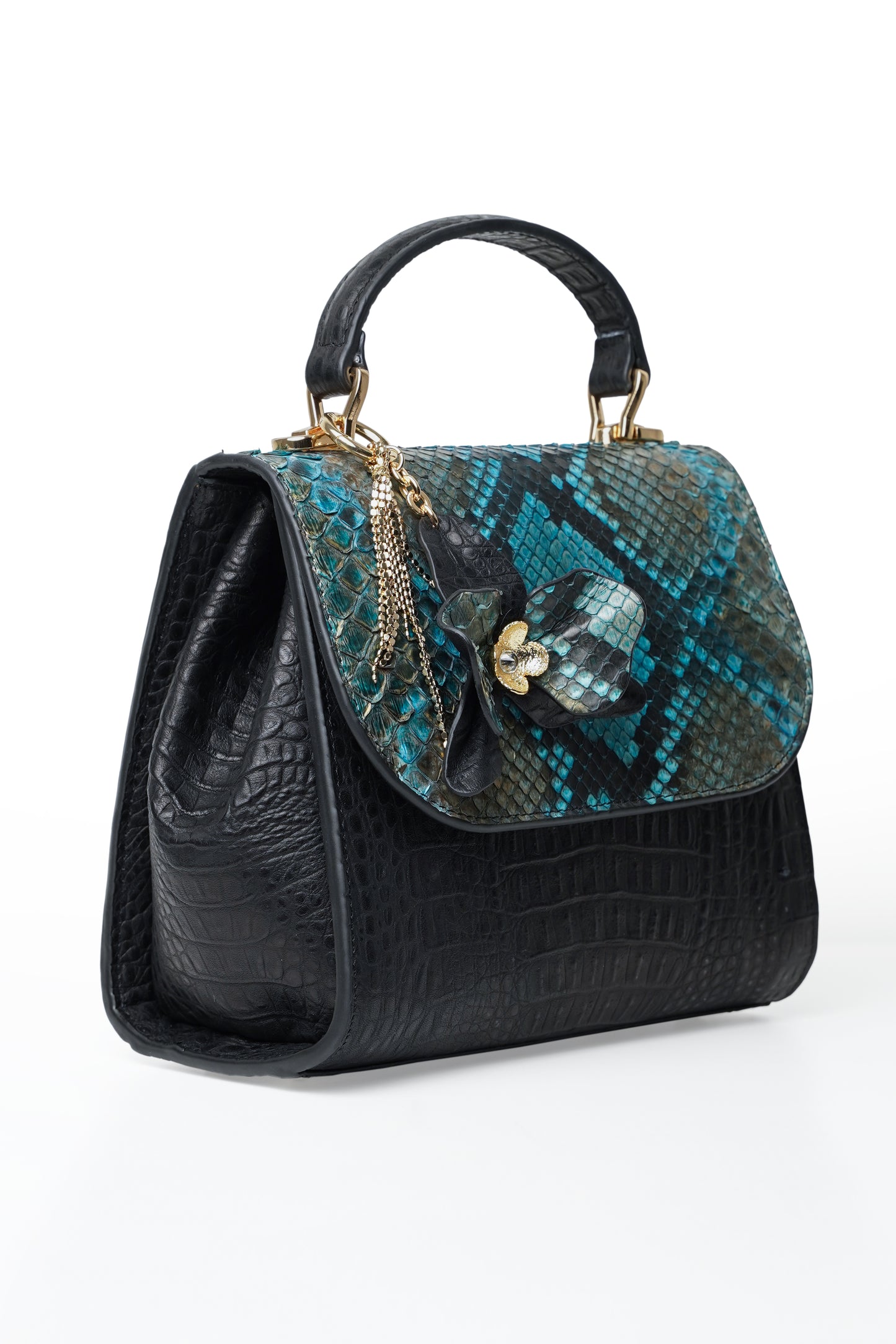 Blue leather orchid handbag with python cover and orchid flower detail.