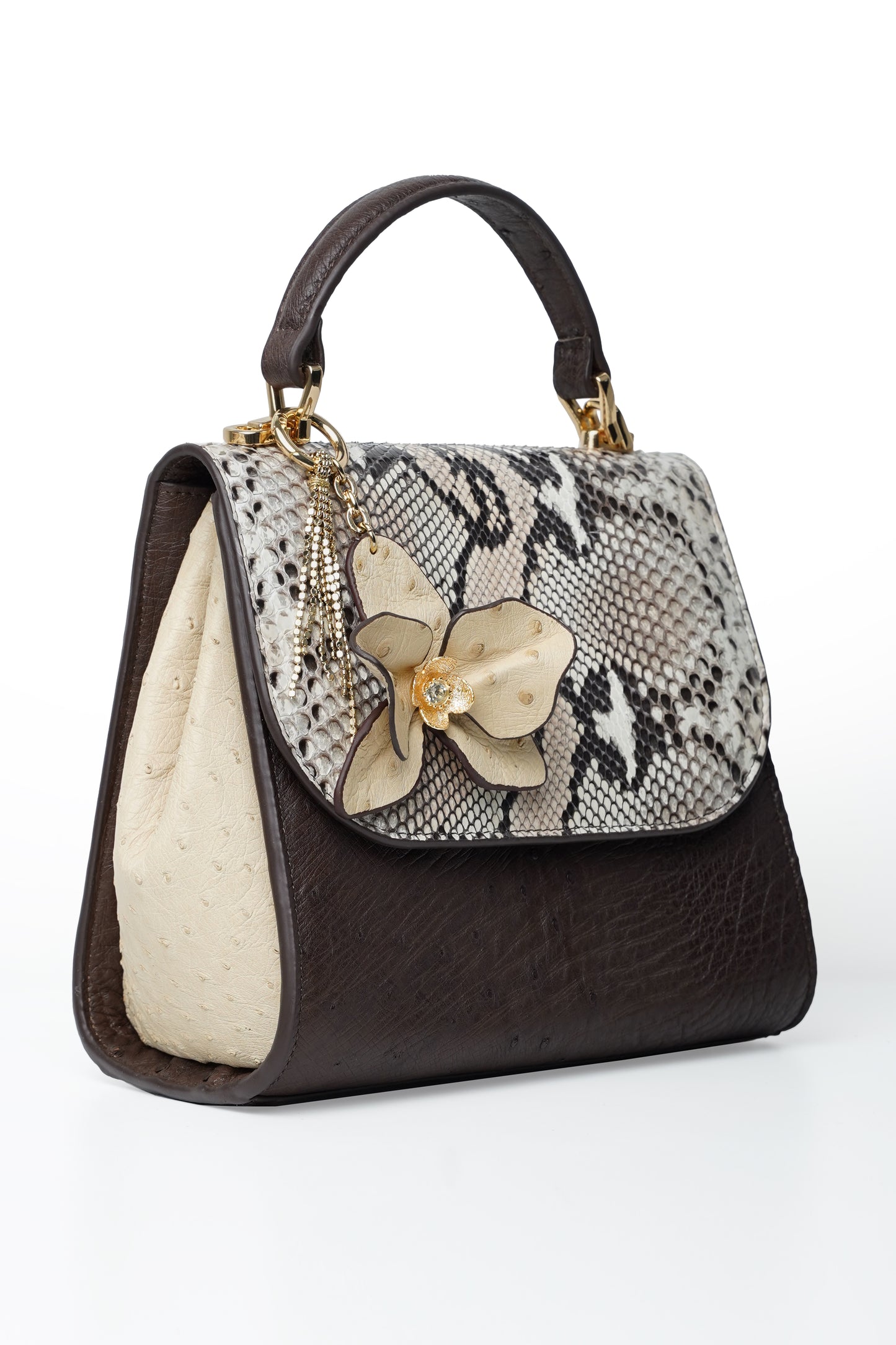 Orchid handbag in python and ostrich leather with butterfly detail and chain strap.