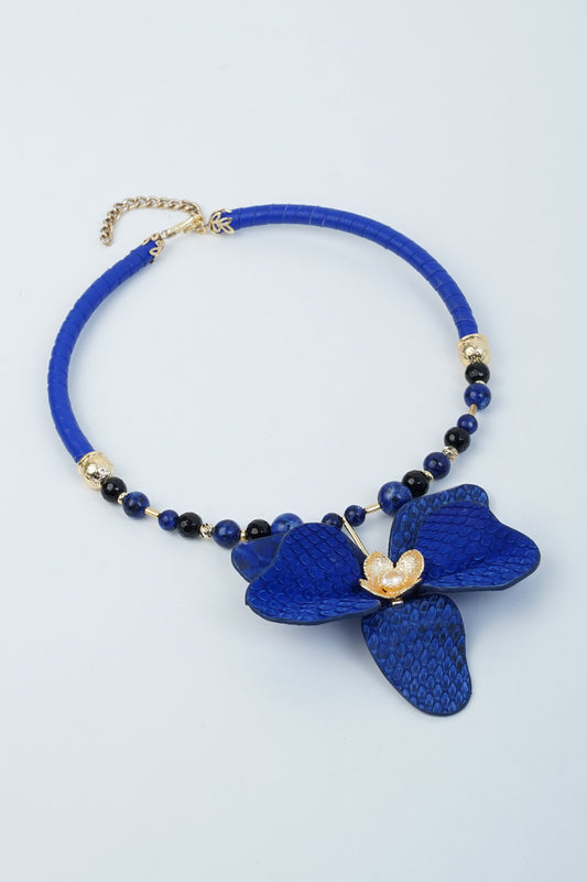 Handmade blue orchid flower necklace with leather and brass details