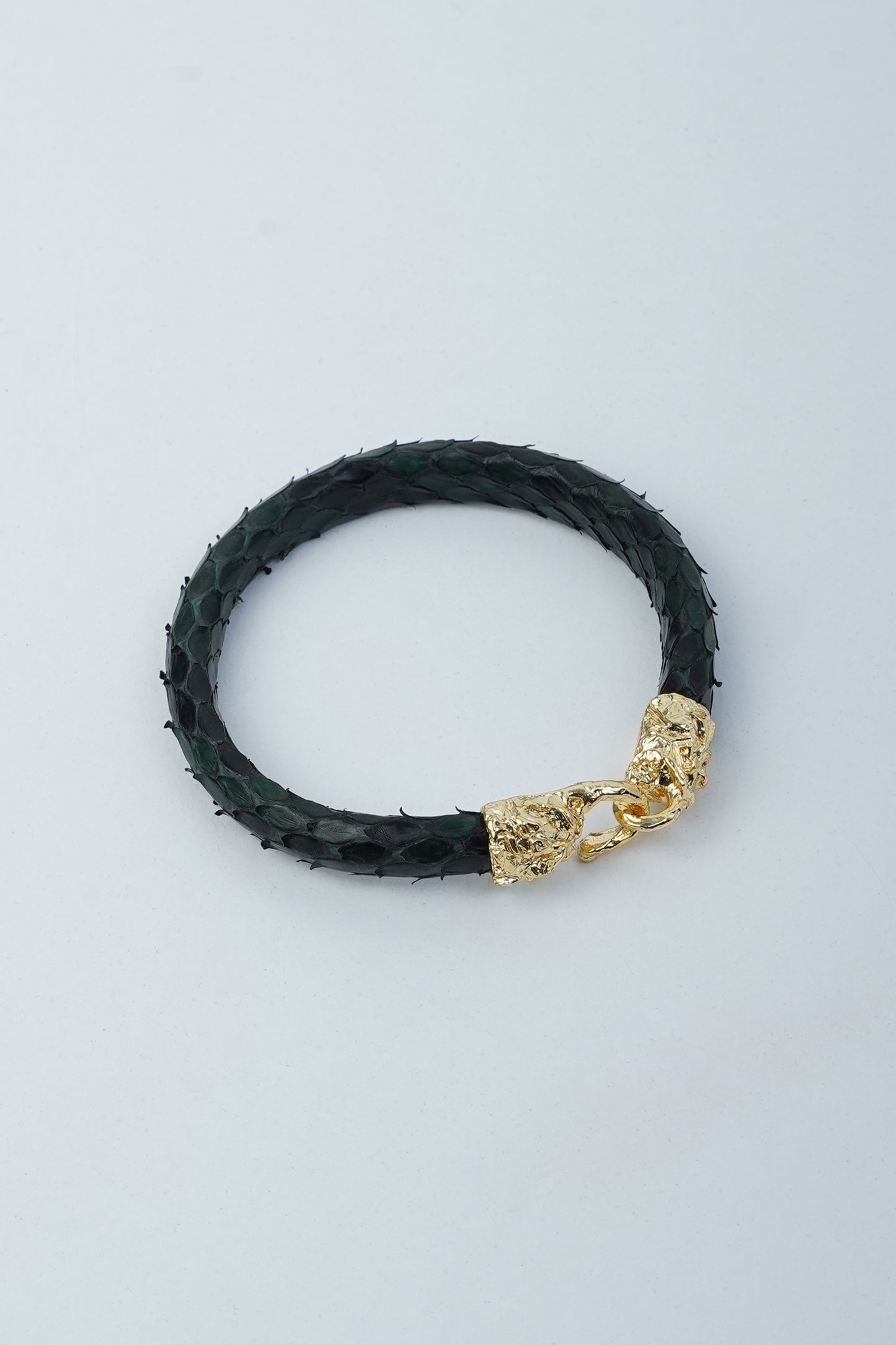Hierapolis Hook Bracelet featuring python skin and gold-plated brass, inspired by Pamukkale travertines.
