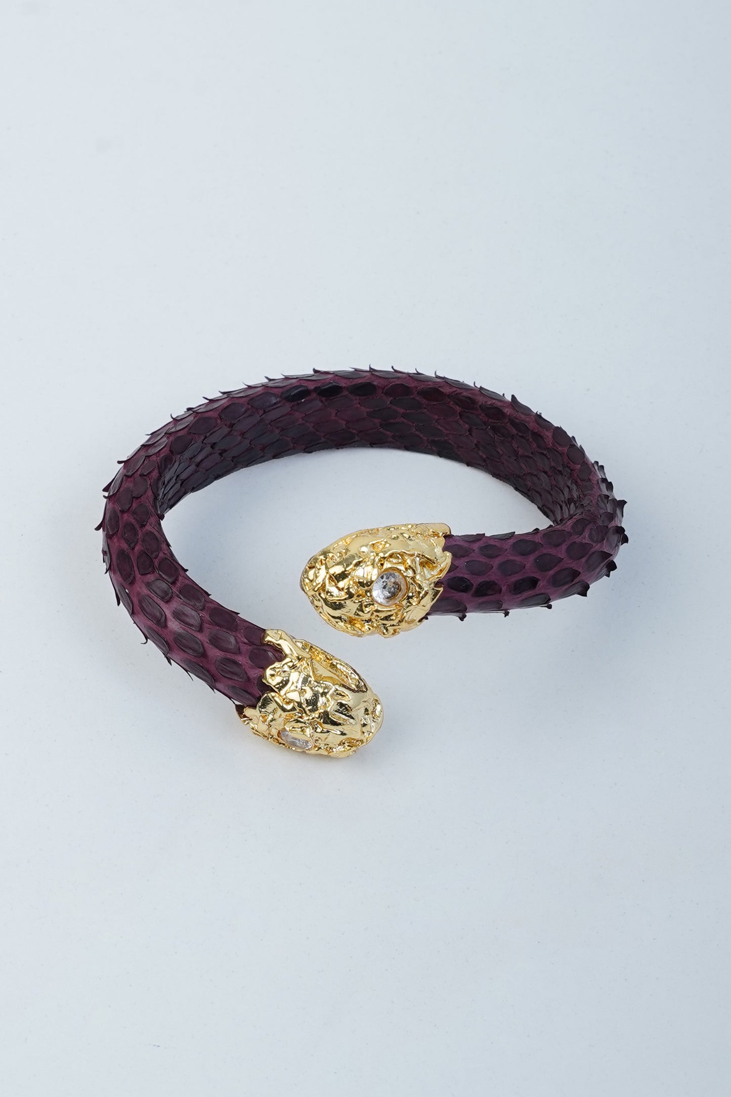 Hierapolis bracelet in burgundy python leather with handmade gold brass detail