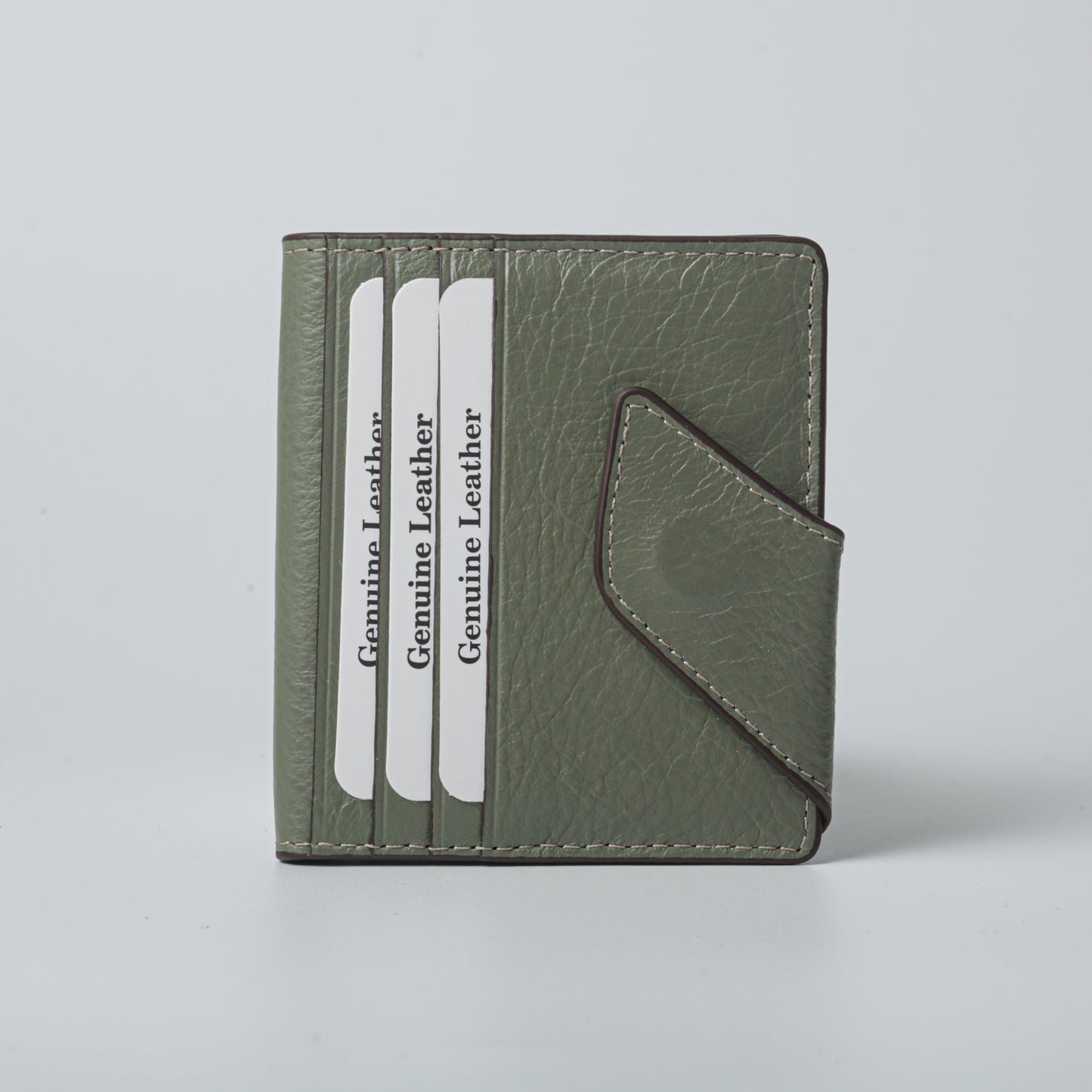 Green ostrich leather unisex wallet with card holder slots and magnetic closure