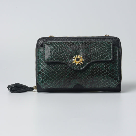 Handmade raspberry bag with gold-plated details, crafted from genuine python leather and calfskin.