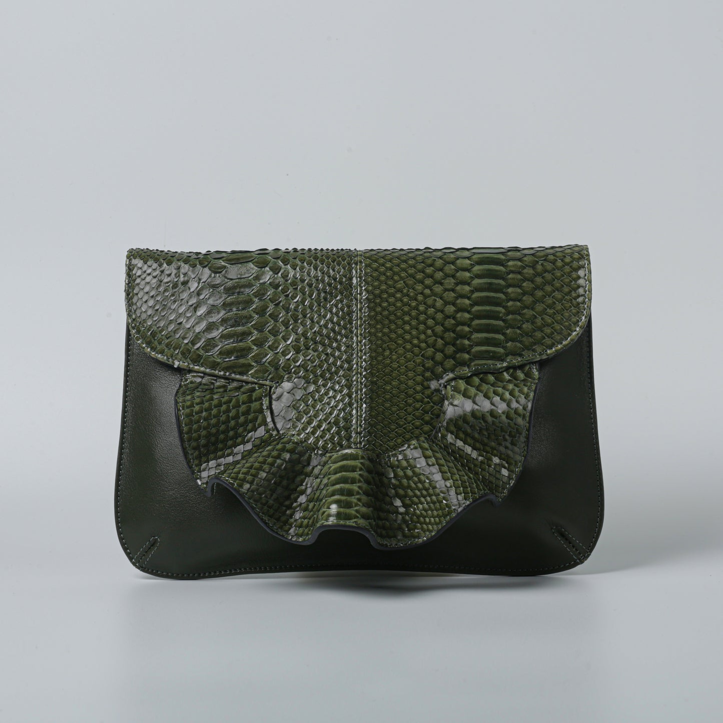 Emerald green handmade butterfly bag with python leather details.