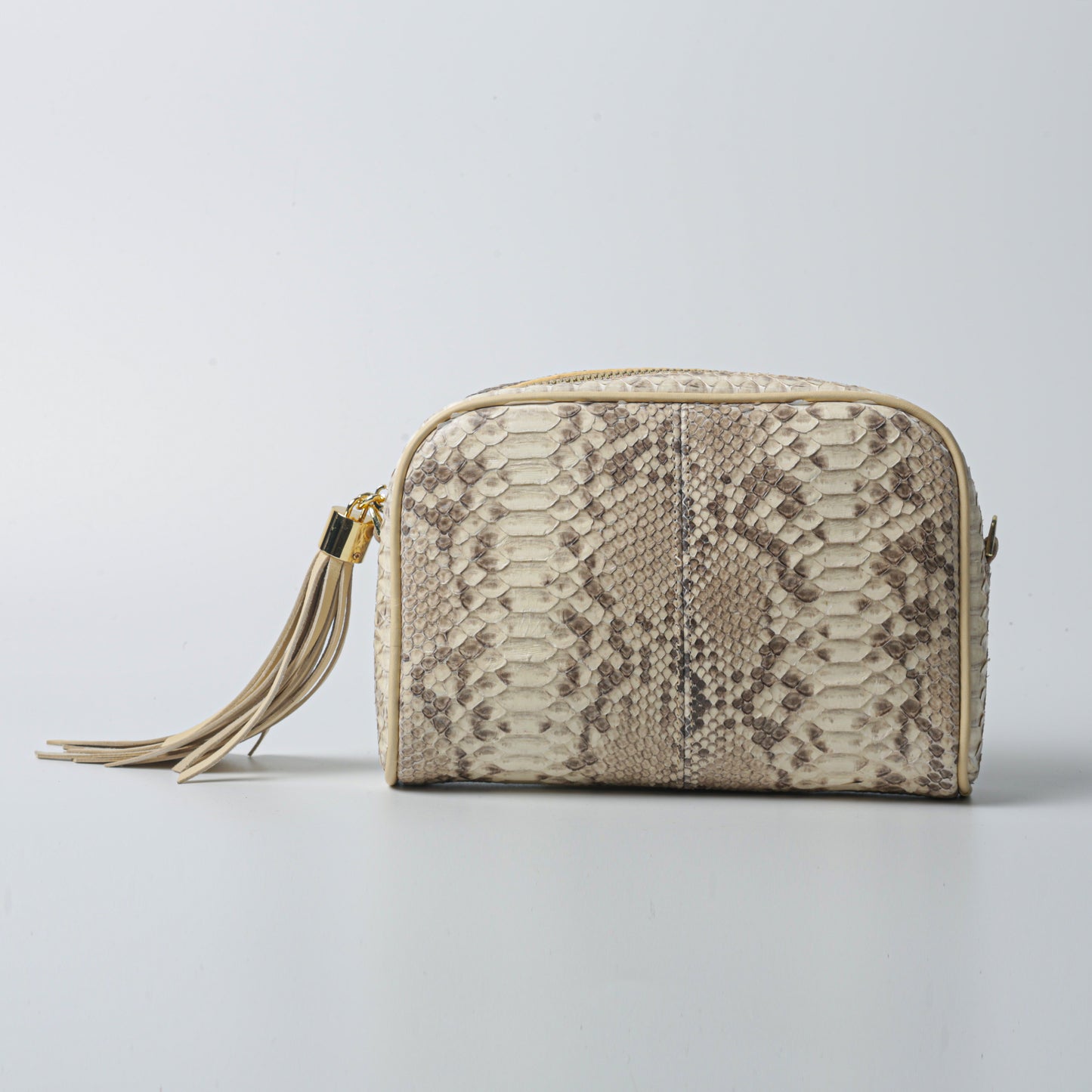 Kwas Bag – Beige Python Leather Handbag with Tassel Detail