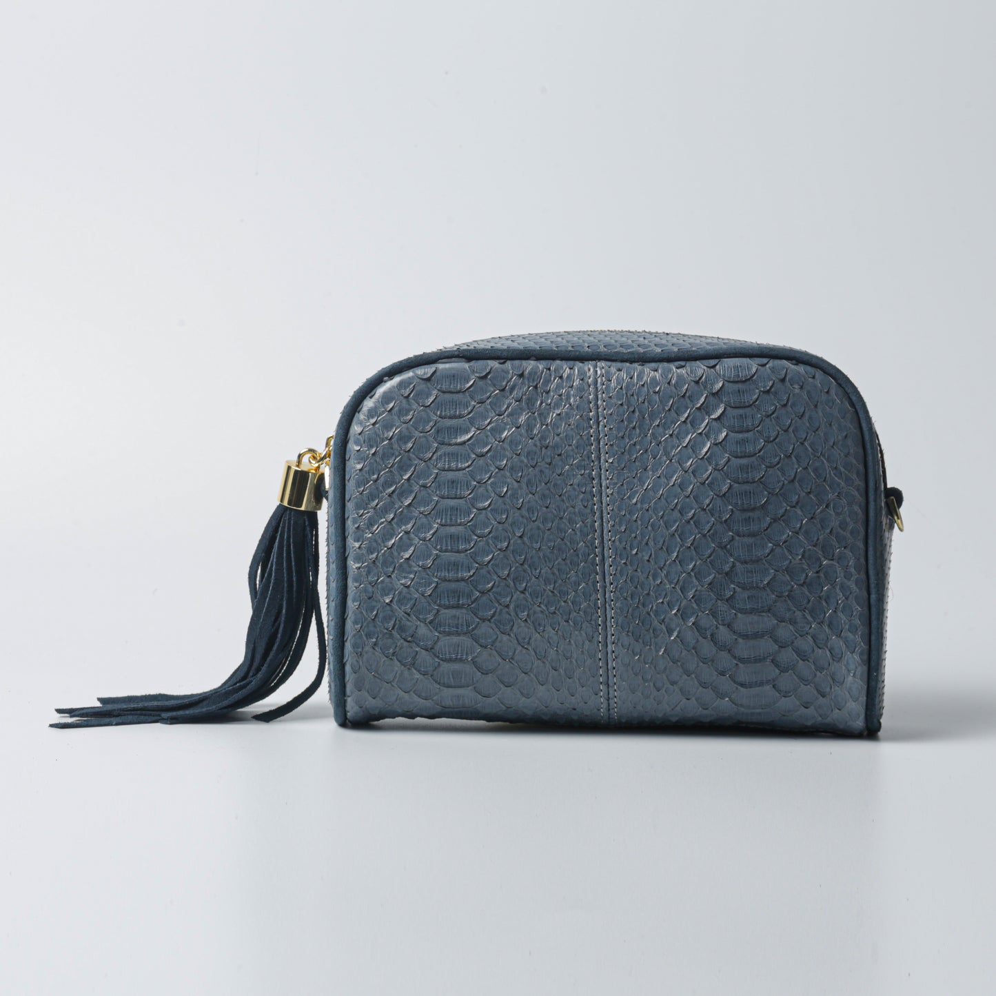 Luxury rectangular python leather Kwass bag with tassel and removable chain strap – dark blue color