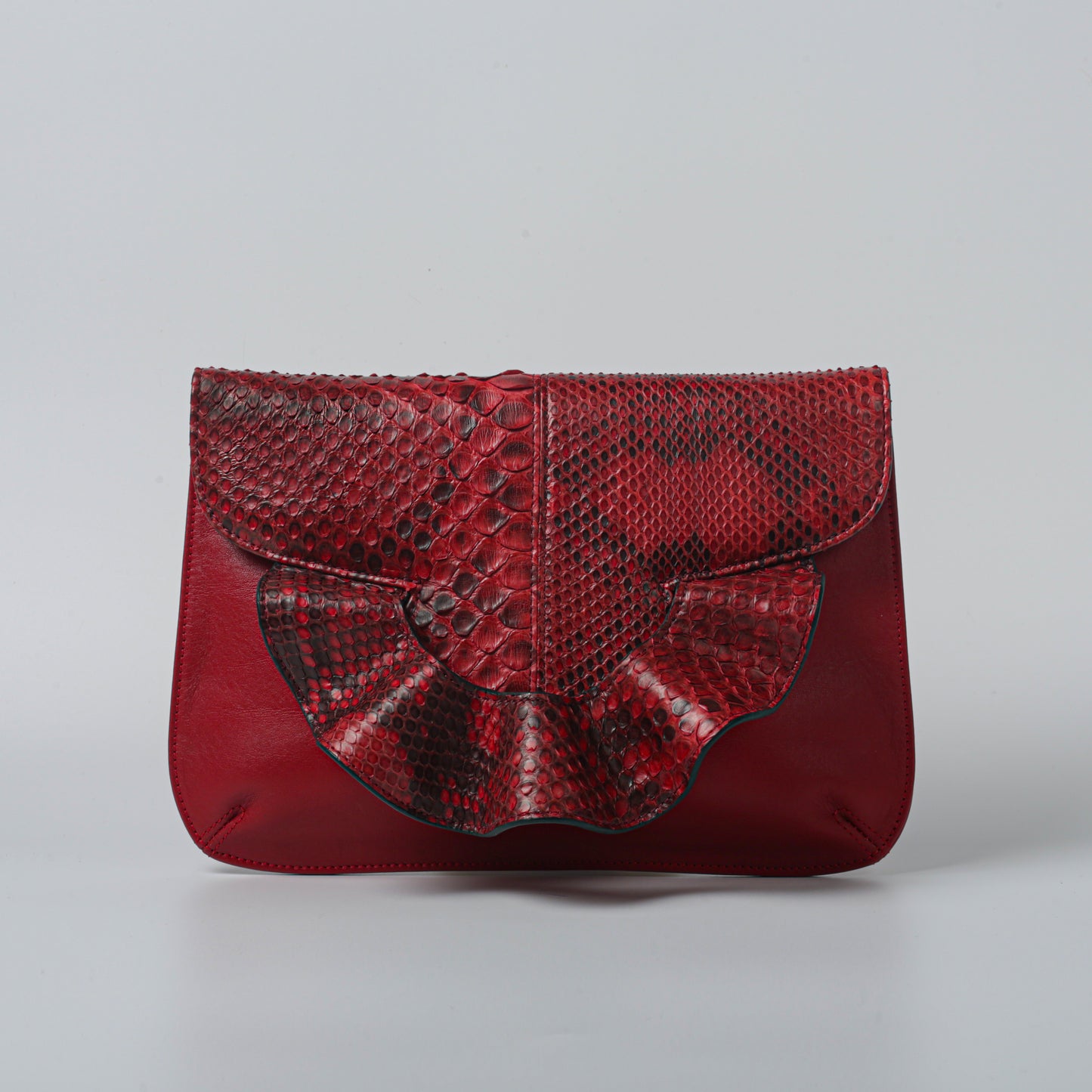 Emerald green handmade butterfly bag with python leather and calfskin.