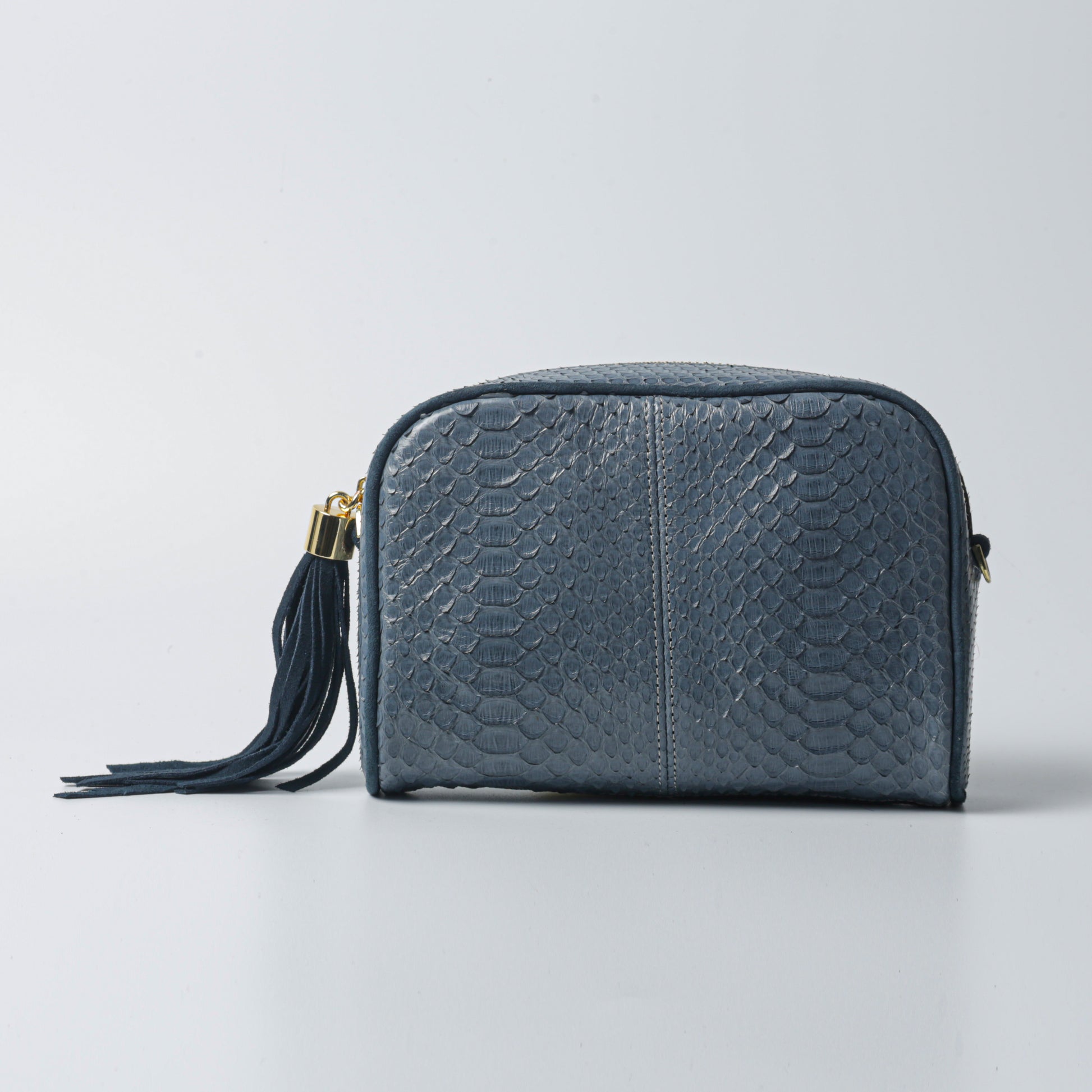 Luxury rectangular python leather Kwass bag with tassel and removable chain strap – dark blue color